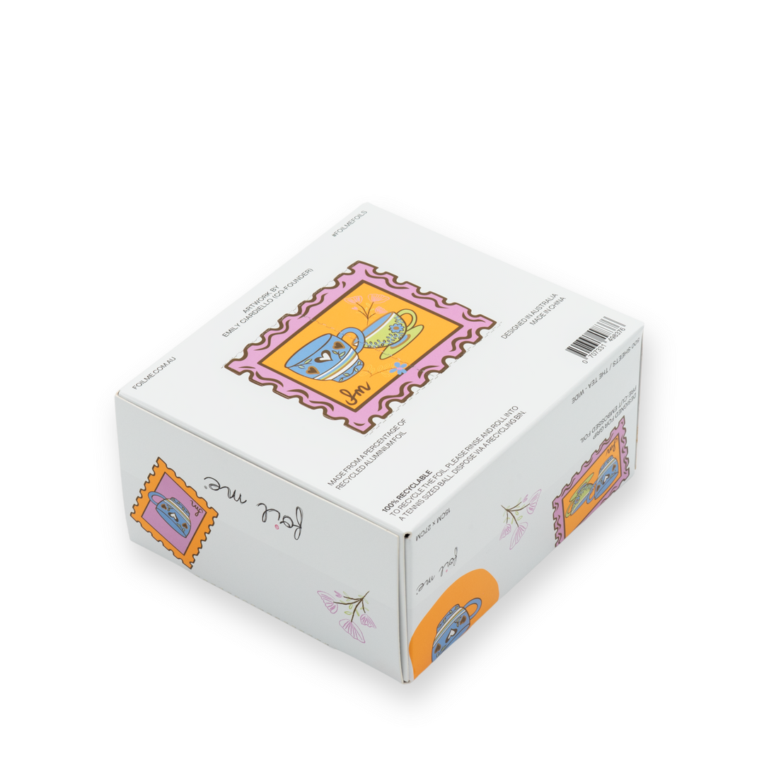 White box with colorful graphics on a white background. Foil Me The Tea collection – premium fine embossed hair foils in cute design