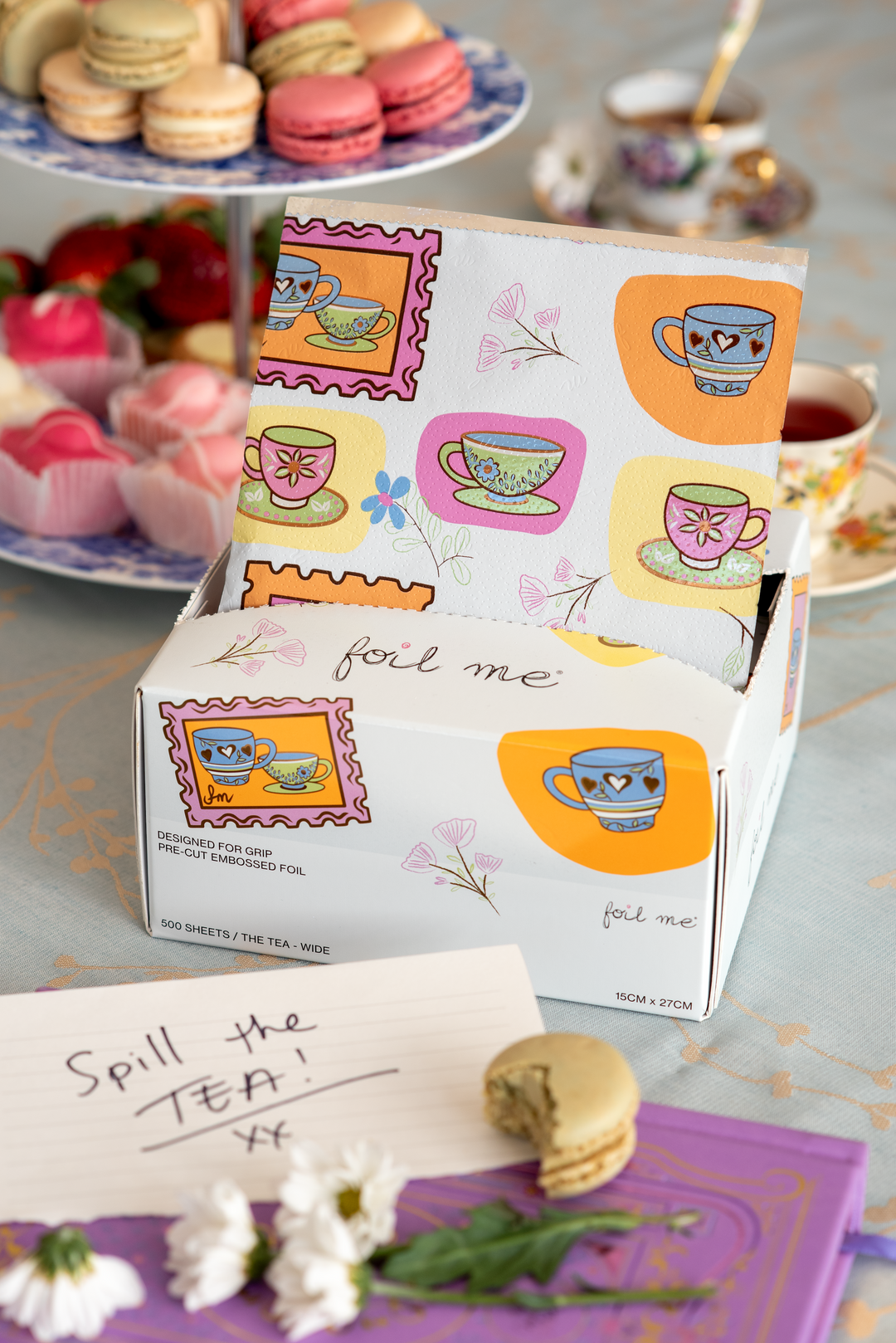 Foil Me The Tea collection tea themed premium fine embossed hair foils in cute design decorative illustrations on a table with tea cups and cookies.